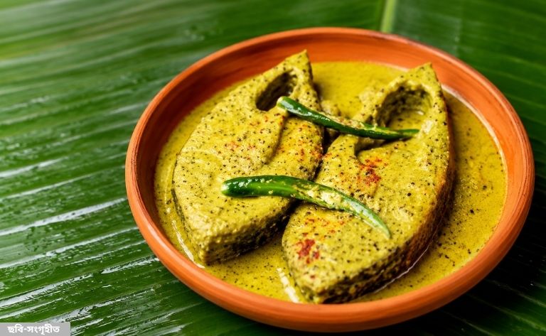 মাটির চুলায় গ্রামের স্বাদে সরিষা ইলিশ ফিরছে ঐতিহ্যের ঘ্রাণ
